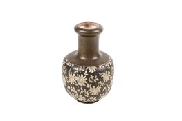 A Doulton Burslem bulbous vase decorated with white flowers. US Patent 314.002.