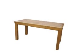 A contemporary pine kitchen table.