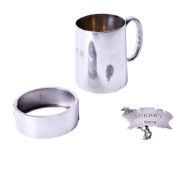 Three small hallmarked pieces of silver.