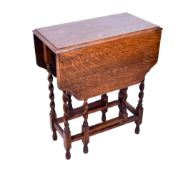 An early 20th century gateleg table.