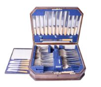 A Walker & Hall oak canteen of cutlery and a set of silver butter knives.