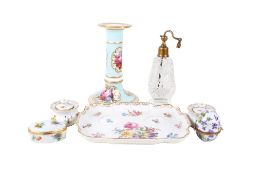 A group of five mostly porcelain items.