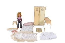 A vintage Pedigree Sindy doll and accessories.