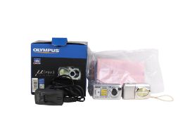 Two digital compact cameras.