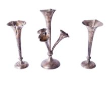A pair of vintage silver weighted tulip vases and a silver epergne.