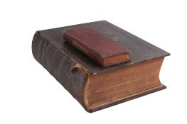 Two antique books. Including a 19th century family Bible and Hoppus's Practical measurer.