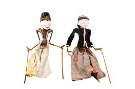Two vintage Balinese stick puppets.