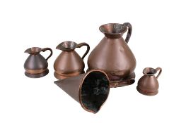 A collection of five assorted vintage copper kitchenalia.