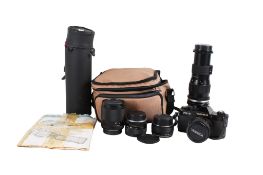 Yashica FX-3 SLR 35mm film camera outfit.