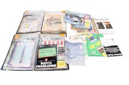A collection of 1980s football programmes.