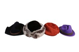 Four ladies' designer hats.