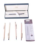 A collection of Cross pens and accessories.