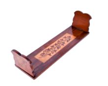 A mahogany marquetry book trough, possibly Irish.