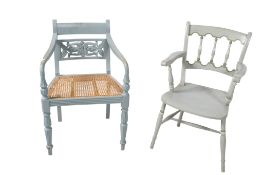 Two blue painted vintage chairs.
