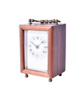 A small carriage clock.