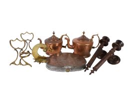 A group of assorted copper and brass items.