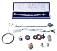 A group of silver and other jewellery.