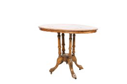 A Victorian oval inlaid quarter veneered centre table.