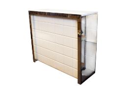 A late 20th century chrome and white padded vinyl drinks/cocktail bar.