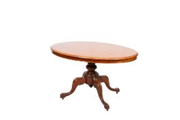 A Victorian oval tilt-top mahogany breakfast table.