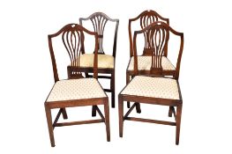 A matched set of four antique Hepplewhite style mahogany dining chairs.