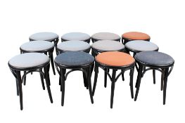 A group of twelve TON design no 60 upholstered bentwood stools.