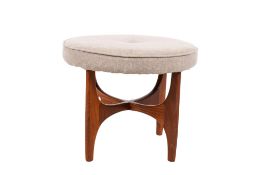A G-Plan Fresco (red label) mid-century teak footstool. Having a round upholstered seat.