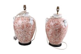 A pair of contemporary ceramic table lamps.