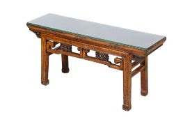 An Asian style wooden bench.