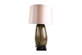 A Porta Romana Coffee Bean contemporary glass table lamp. Raised on a rectangular wooden base.