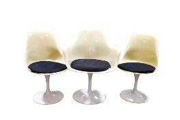 A set of three Sdawy 'tulip' style swivel chairs.