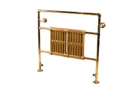 A gilt metal bathroom towel rail radiator.