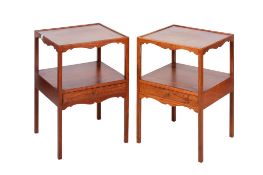A pair of 20th century hardwood bedside tables/cabinets.