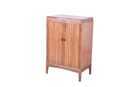 A mid-century mahogany cocktail cabinet.