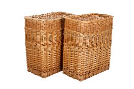 A pair of large wicker baskets. Of rectangular form, H61cm x W29cm x D49cm.
