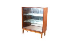 A Turnidge mid-century glazed teak display bookcase.