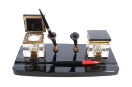 An Art Deco style black opaque glass inkwell desk pen stand.