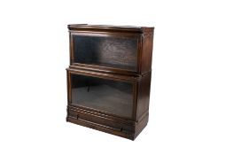 A 'Wernicke' style two-section oak waterfall bookcase.