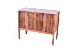 A mid-century two door Teak cabinet.