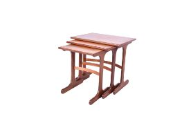 A G-Plan teak mid-century nest of three tables.