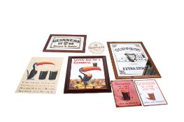 A collection of Guinness related advertising items. Including three bar wall mirrors, signs, etc.