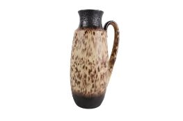 A mid-century West German Fat Lava pottery vase. With a handle.