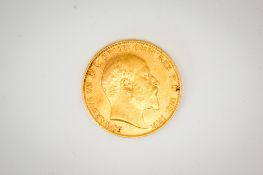 A 1909 gold sovereign coin. Weight 8g.