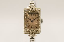 A vintage Swiss Datum white gold and diamond cocktail watch.