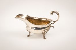 An early 20th century hallmarked silver sauce boat.