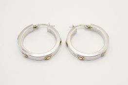 A pair of 9ct white gold hoop form earrings.