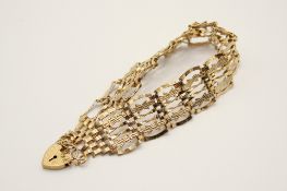 A 9ct gold textured gate link bracelet.