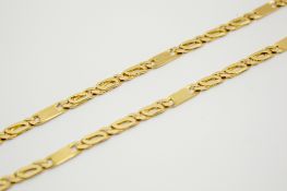 A yellow metal flat link chain necklace. WIth small panel intervals, clasps marked 585 and 6.