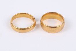 Two 22ct gold wedding bands (one broken).