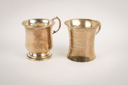 Two early 20th century silver christening mugs.